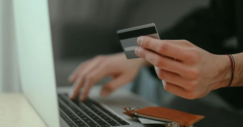 A person using a tablet to write a formal complaint letter regarding a product refund or service issue.